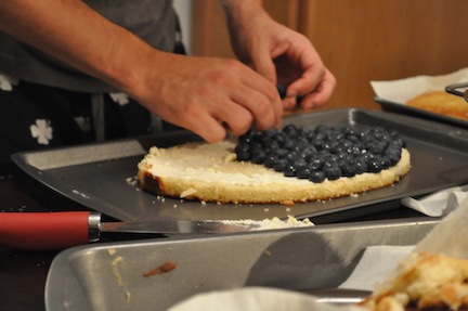 Layer 1 of the cake with fresh blueberries Layer 1 of the cake with fresh blueberries
