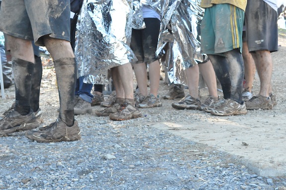 Waiting for their bags... muddy mudders Waiting for their bags... muddy mudders