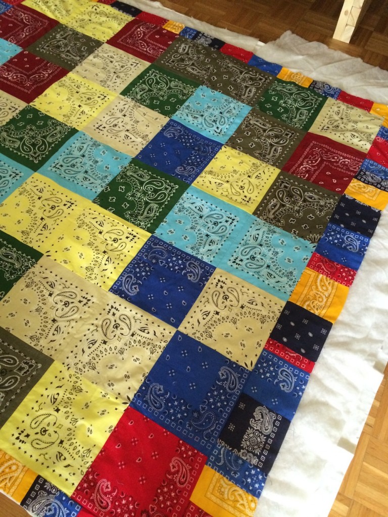 I put together this quilt of old handkerchiefs over the weekend. 